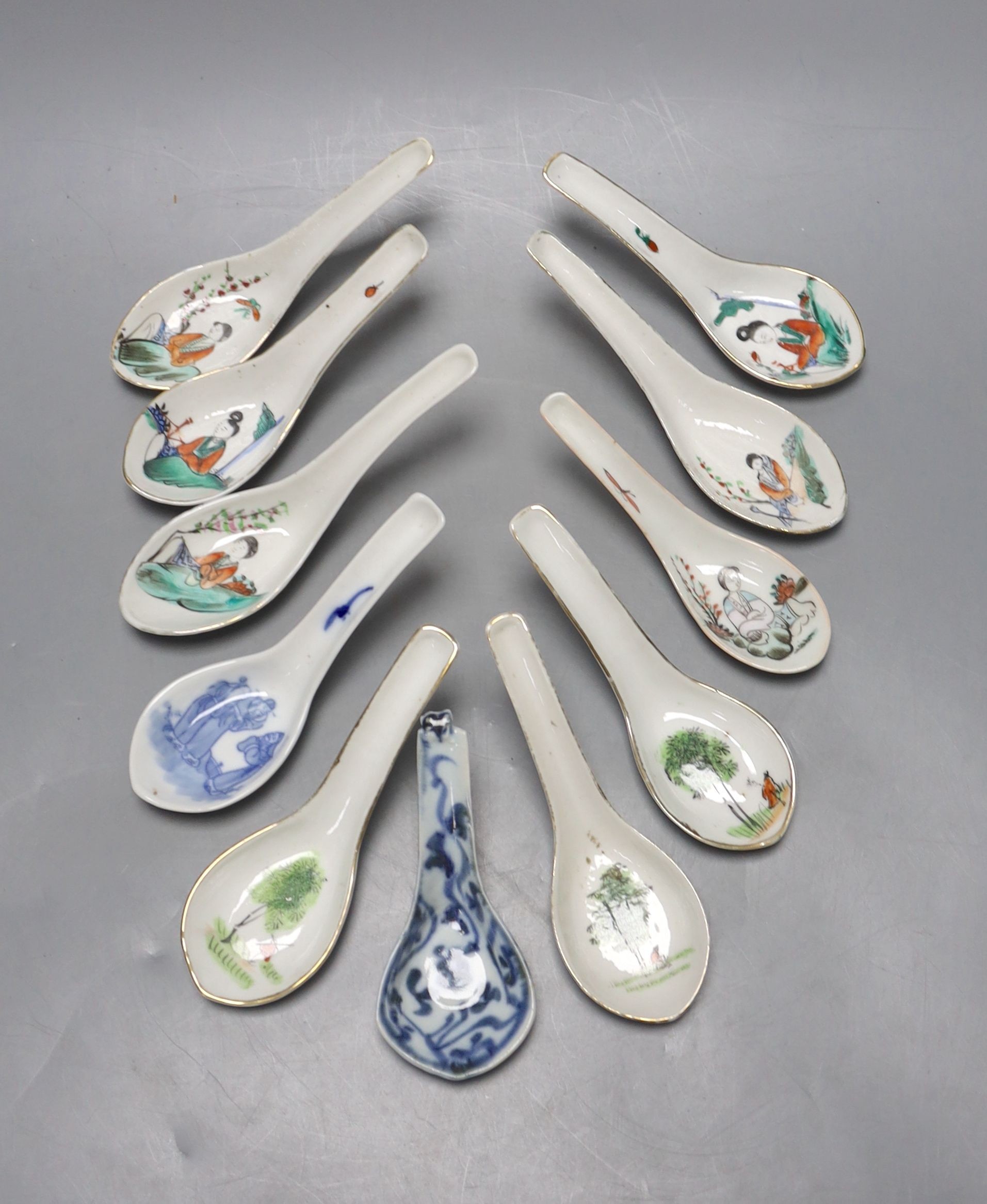 Eleven Chinese porcelain rice spoons, largest 15 cms long.